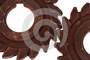 Two incredible rusty chocolate gears