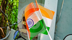 Two Indian tricolor national flags in nature background. Independence Day and Republic Day of India. 15 August Indian Tiranga