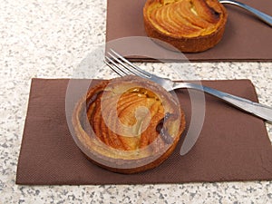 Two individual French apple tartes