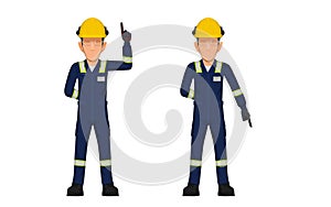 Two industrial worker are pointing up and pointing down