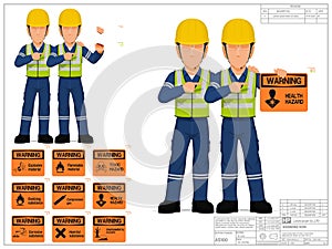 Two industrial workers are presenting warning sign on white background