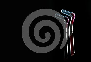Two interdental brush with cover isolated on dark background with copy space. Dental care concept.