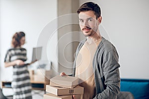 Two Internet shop workers handling their office tasks