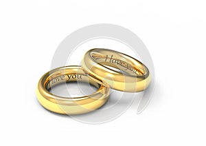 Two intertwined gold wedding rings.