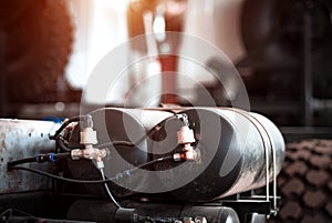 Two iron gas automobile cylinders