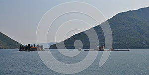 Two islands in the meadle of the bay photo