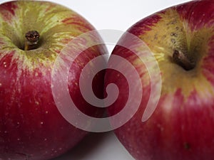 Two isolated akane apple
