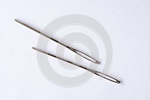 Two Isolated Hand Sewing Needles