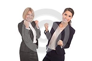 Two isolated successful woman working in a team. Isolated portrait with two businesswoman.