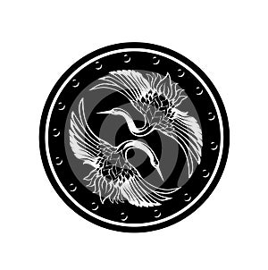 Two japanese crane birds with spread wings inside round shield black and white vector design