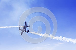 Two jet fighters flying in the blue sky