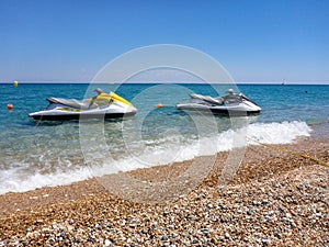 Two jet skis on the beautiful Skala beach of Kefalonia island, Ionian sea, Greece