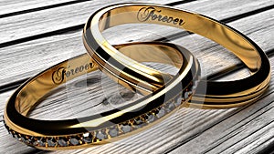 Two joined golden wedding rings on a wooden table