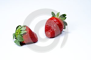 Two juicy red strawberries