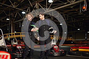 two kart racers standing near racing