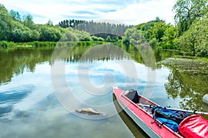 Two kayaks standing in water