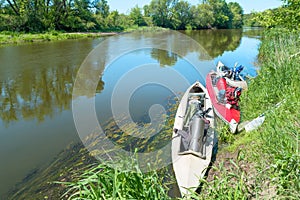 Two kayaks standing in water