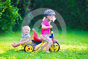 Two kids on a bike