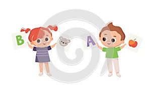 Two Kids, boy and girl holds leanning flashcards