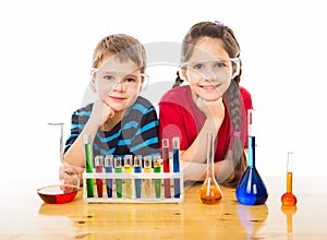 Two kids with chemical equipment
