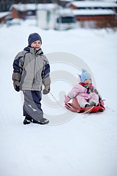 Two kids outdoors on winter day