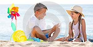 Two kids playing beach
