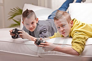 Two kids playing video games