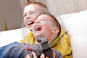 Two kids playing video games