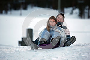 Two kids on sled