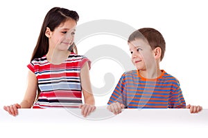 Two kids standing with empty blank