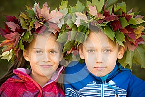 Two Kids wearing Wreath of Leaves