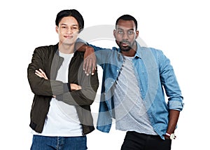 Two of a kind. Cropped portrait of a two young men standing against a white background.