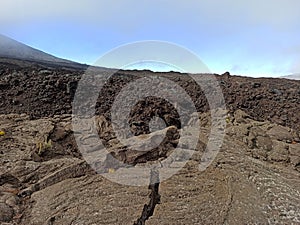 Two kind of lava flows on Fournaise volcano pahoehoe lava flow and aa lava flow, Reunion photo