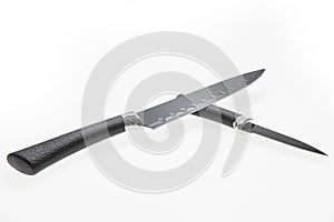 Two kitchen knives on a white background close-up