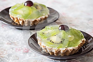 Two Kiwi fruit tarts