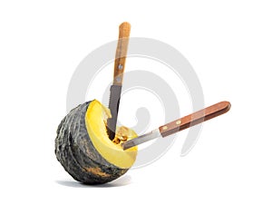Two knife stab equal part pumkin on white background