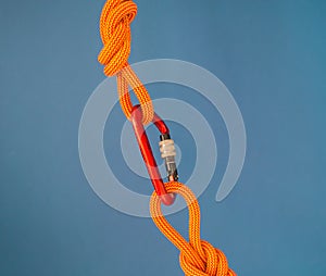 Two knots connected by a carbine