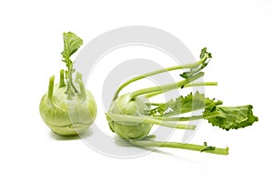 two kohlrabi isolated on white background.