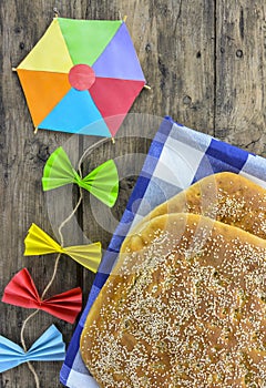 Two lagana breads and colorful kite