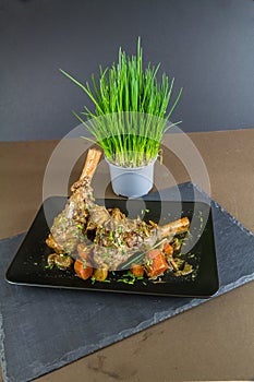 Two lamb shanks casseroled