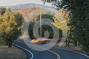 Two lane, winding paved country road in southern califonia photo