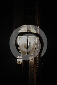 Two Lanterns with Ice at Night