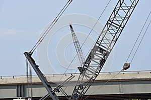 Two large cranes on a construction site