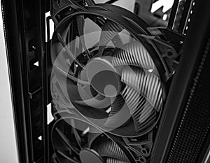 Two large PC cooling fans mounted vertically inside a computer case