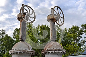 Two large pipeline valves on the heating main pipes