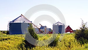 Large Silos and Red Barn in the Midwest