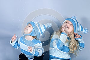 Two laughing girls in snow