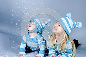 Two laughing girls in snow