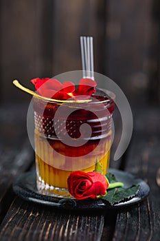 Two-layered cocktail with rose