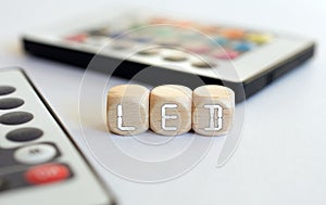 Two LED Remotes With LED-Cube Acronym